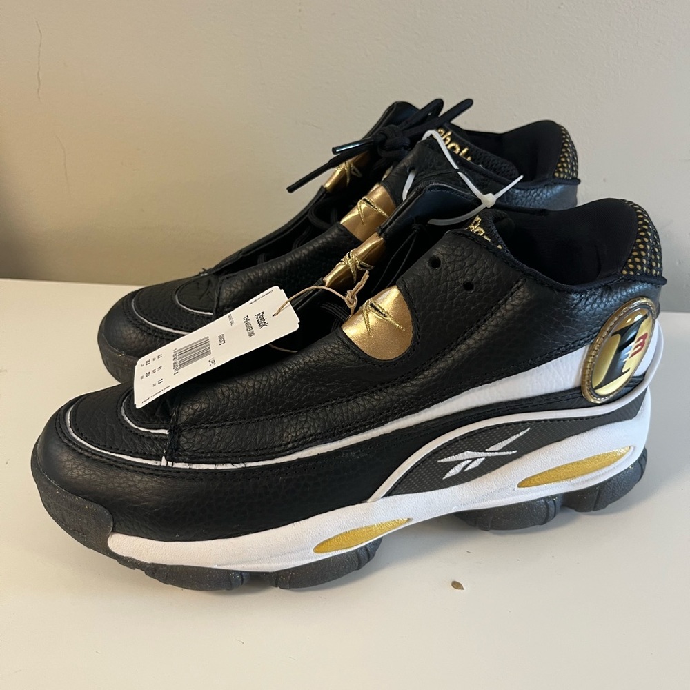 Reebok Black and Gold Sneakers